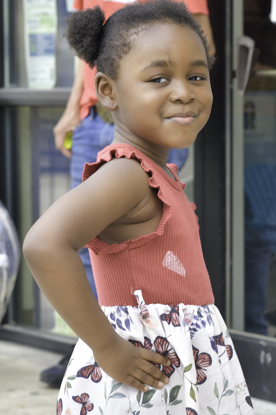 Little girl with hands on hips
